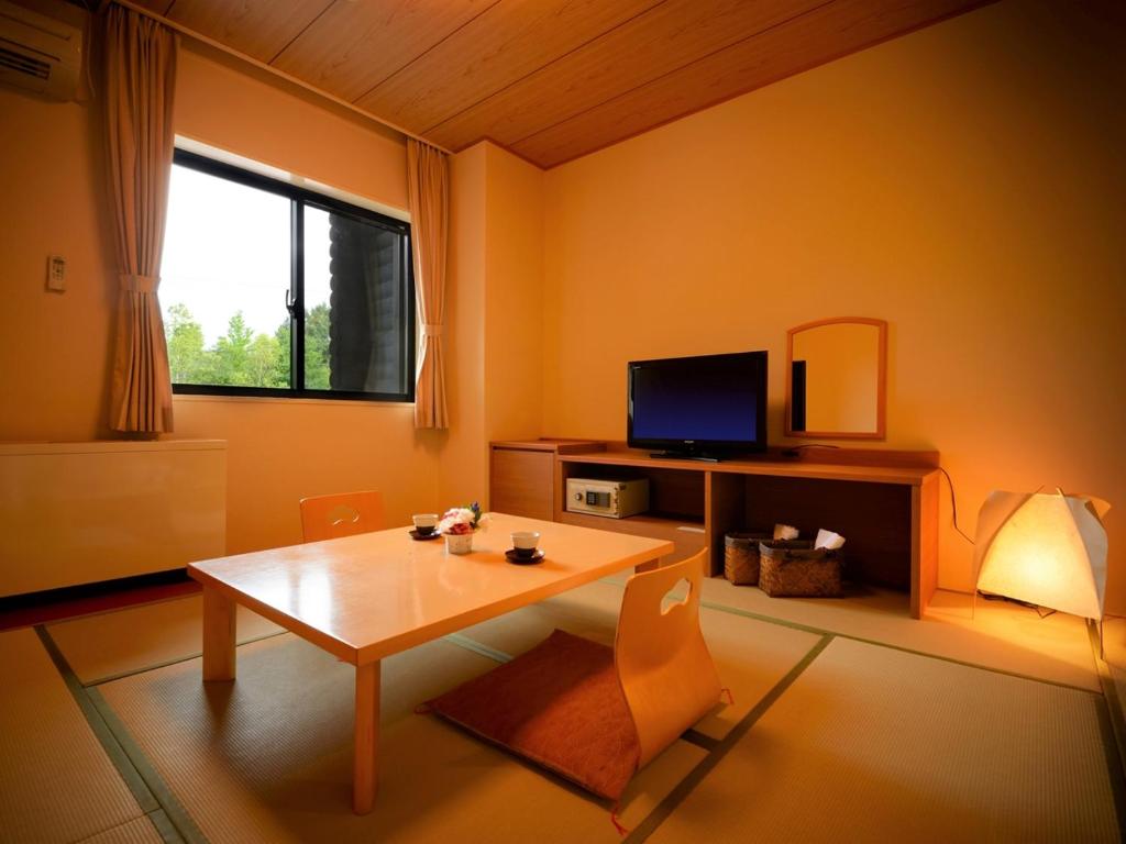 TV a/nebo společenská místnost v ubytování Apikogen Mori no Hotel