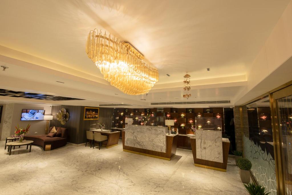 TV a/nebo společenská místnost v ubytování Best Western Darbar