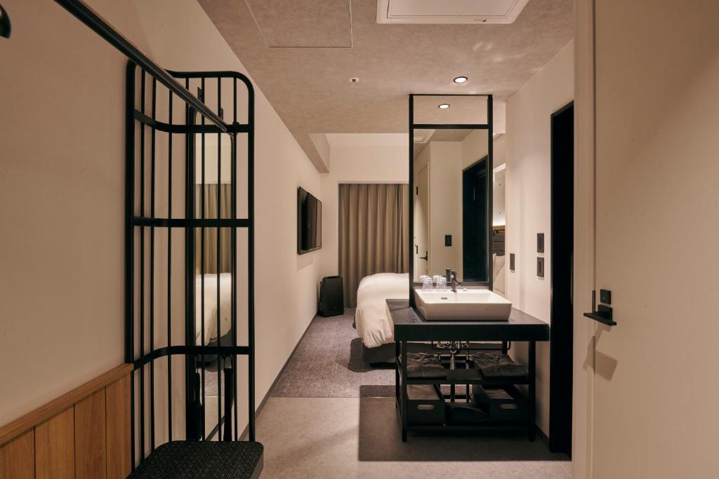 Postel nebo postele na pokoji v ubytování ibis Styles Nagoya