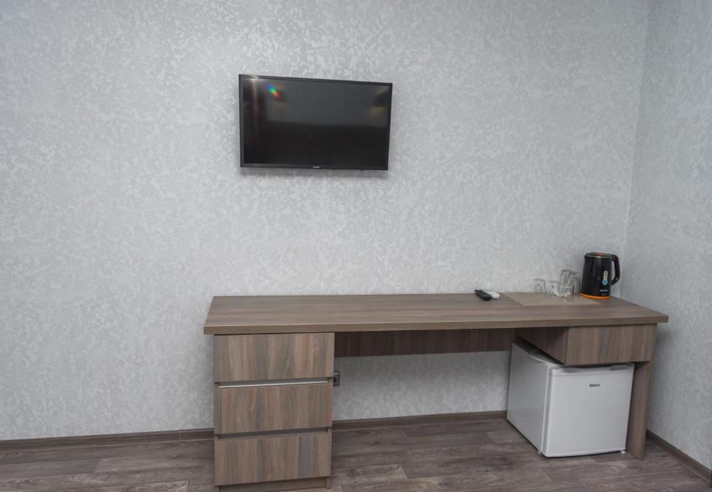 TV a/nebo společenská místnost v ubytování Hotel Voyage Вояж