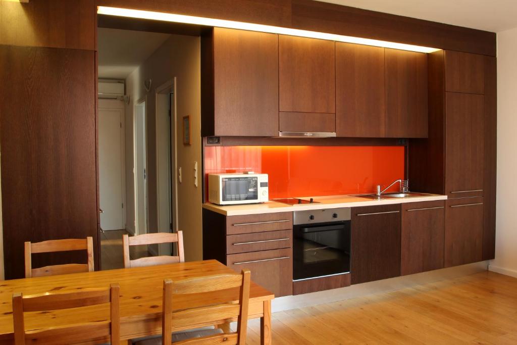 Kuchyňa alebo kuchynka v ubytovaní Prime Apartmans