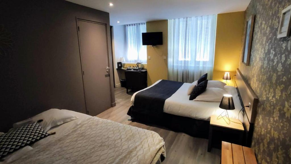 Postel nebo postele na pokoji v ubytování Celtic Hotel