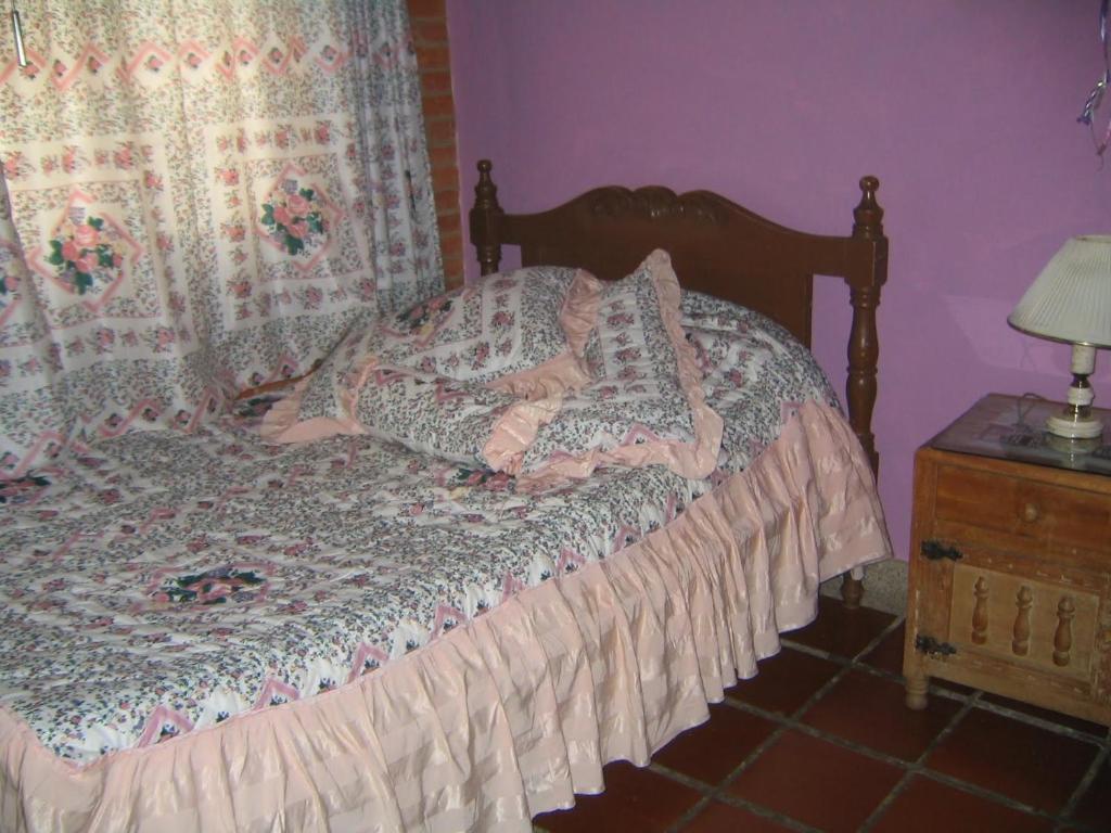 Postel nebo postele na pokoji v ubytování Finca El Ensueño