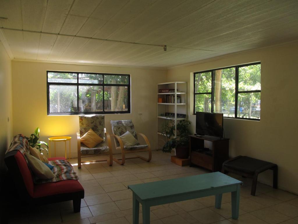 Posezení v ubytování Camping & Hospedaje Rio Laja