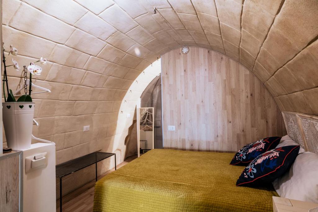 Postel nebo postele na pokoji v ubytování 19.52 Matera
