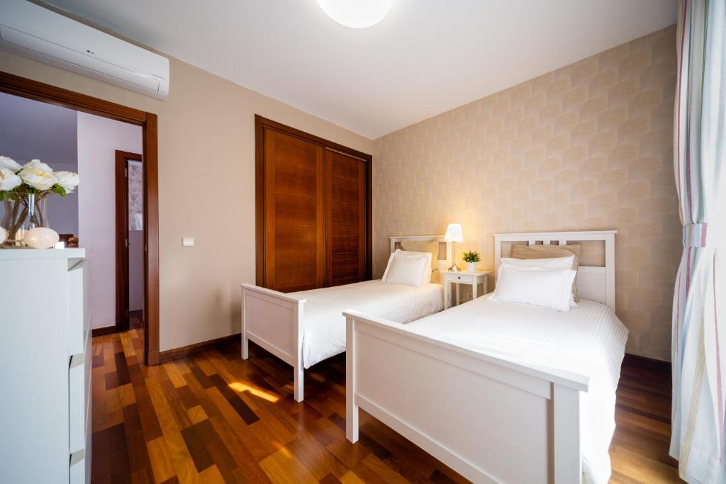 Posteľ alebo postele v izbe v ubytovaní Valentina Villa Private Pool Garden