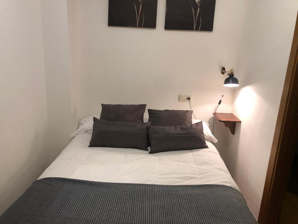 Postel nebo postele na pokoji v ubytování Apartamentos Los Lagos