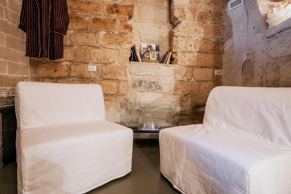 Postel nebo postele na pokoji v ubytování 19.52 Matera