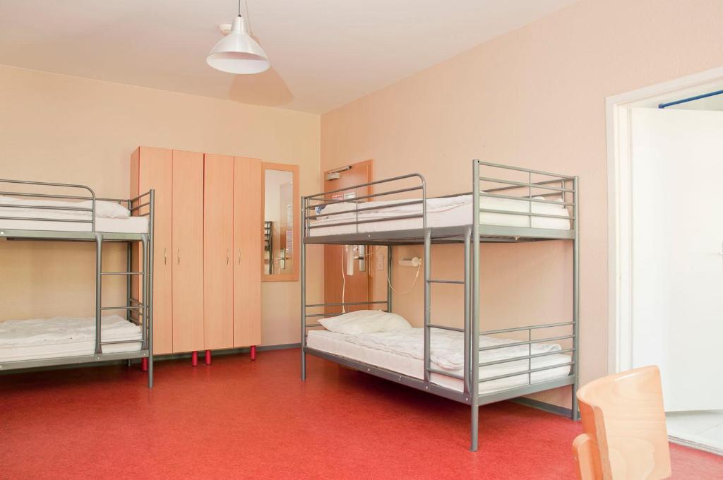 Postel nebo postele na pokoji v ubytování Happy Hotel Berlin