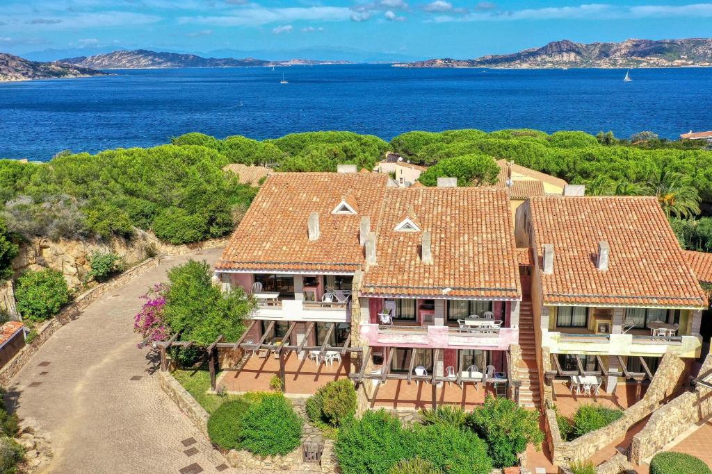 an aerial view of a house with the ocean at Baia Del Faro in Palau