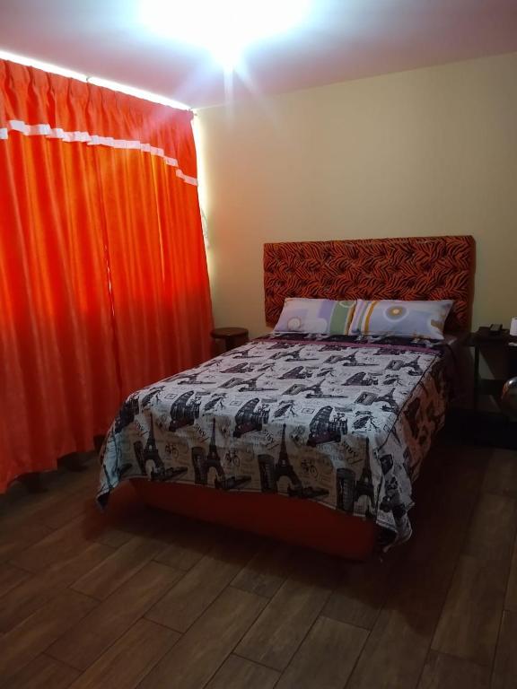 Postel nebo postele na pokoji v ubytování Hostería La Chorrera