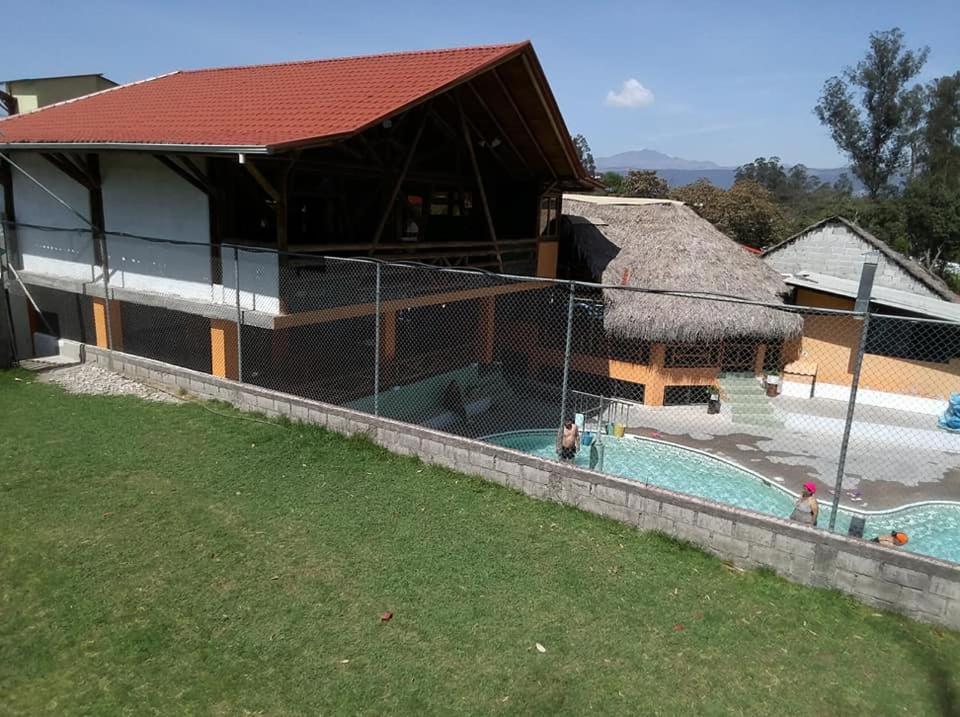 Bazén v ubytování Hostería La Chorrera nebo v jeho okolí