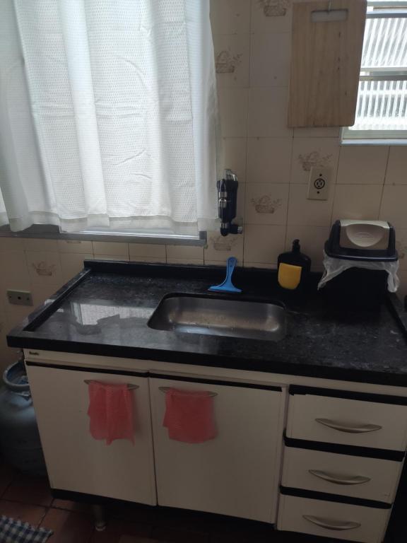  PRAIA GRANDE APARTAMENTO TEMPORADA com ar condicionado