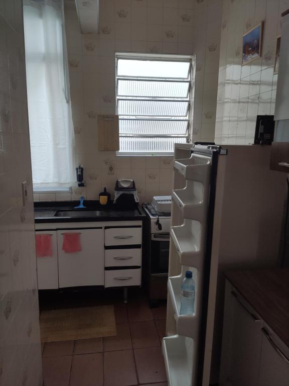  PRAIA GRANDE APARTAMENTO TEMPORADA com ar condicionado