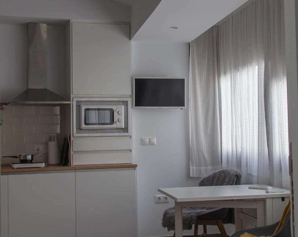 A kitchen or kitchenette at Tándem House