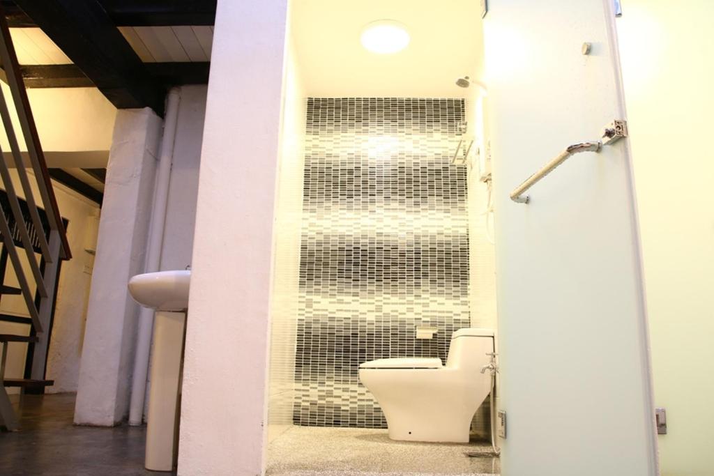 Vannituba majutusasutuses Layang Layang Guest House Melaka