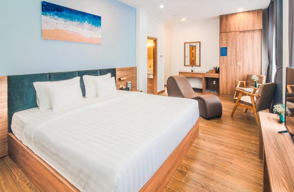 Postel nebo postele na pokoji v ubytování Grand Lee Hotel