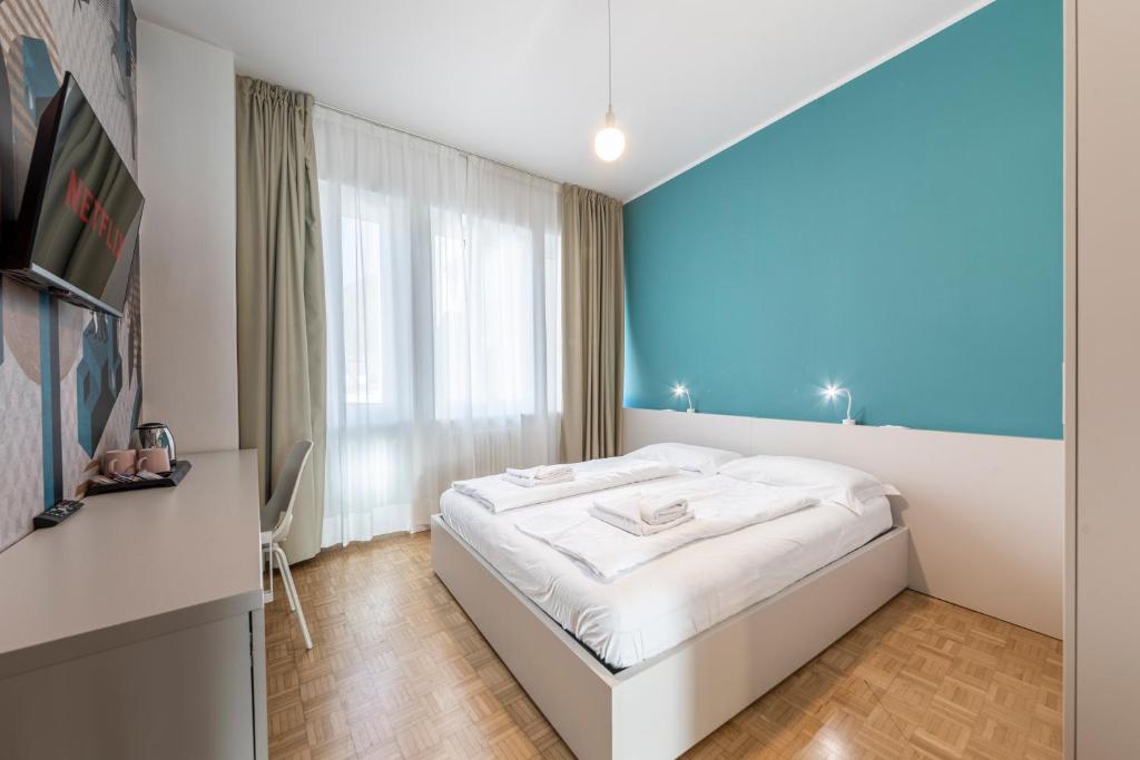 TV a/nebo společenská místnost v ubytování Stay COOPER l Capitol Rooms