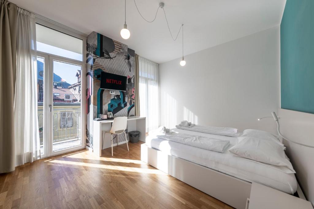 Postel nebo postele na pokoji v ubytování Stay COOPER l Capitol Rooms