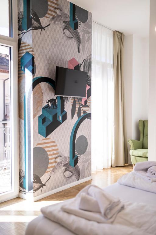 Postel nebo postele na pokoji v ubytování Stay COOPER l Capitol Rooms