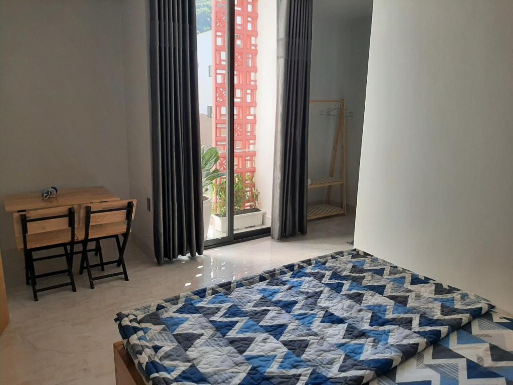 Letto o letti in una camera di Thom's Homestay