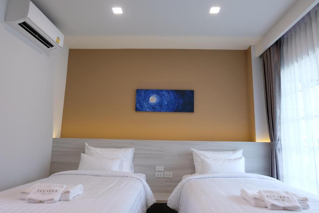 Postel nebo postele na pokoji v ubytování Li CALLA Resort Trat