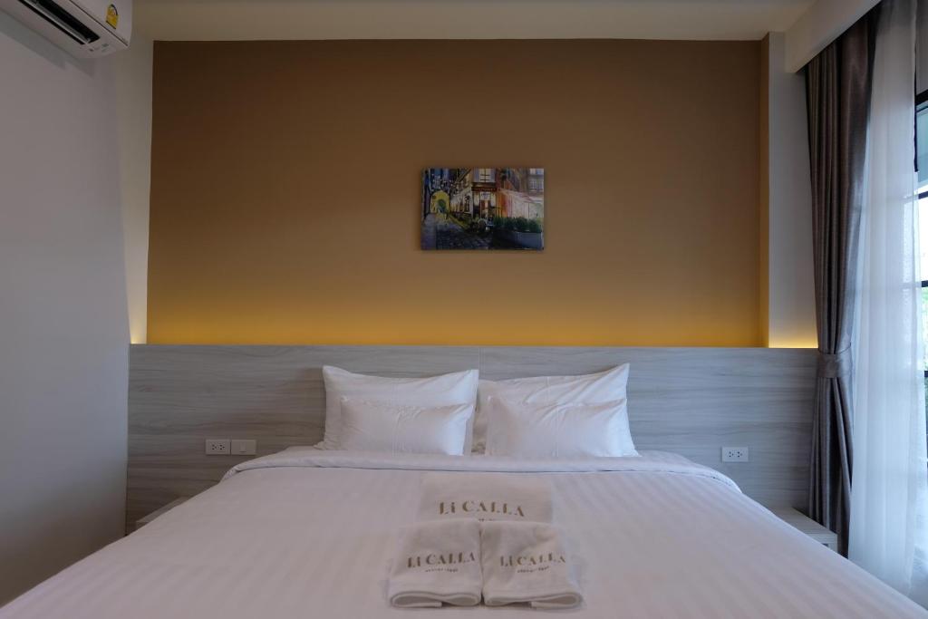 Postel nebo postele na pokoji v ubytování Li CALLA Resort Trat