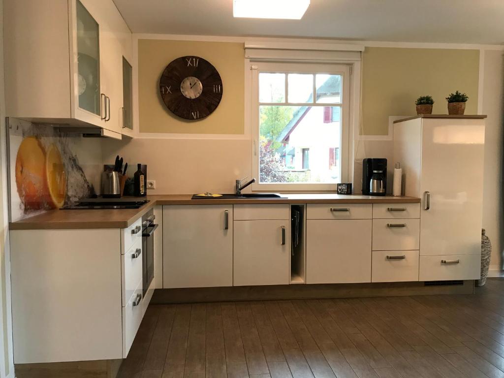 Kuchyň nebo kuchyňský kout v ubytování Ferienhaus Vier Jahreszeiten