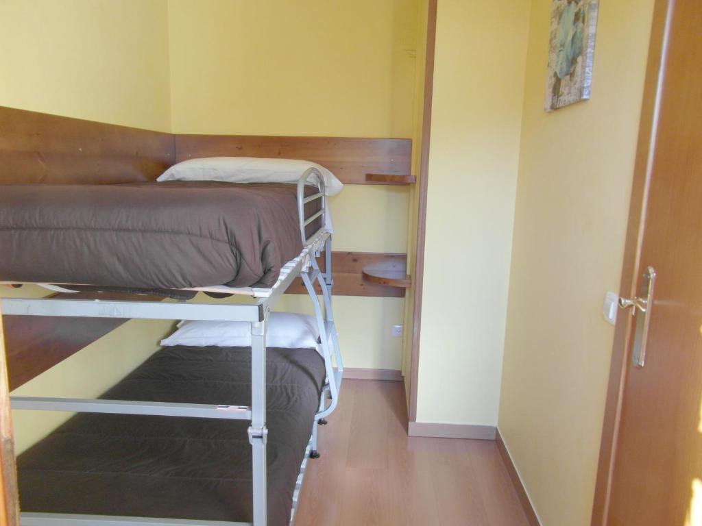 Postel nebo postele na pokoji v ubytování Apartamentos Los Lagos