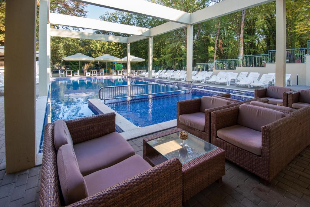 Bazén v ubytování Ariana Hotel nebo v jeho okolí