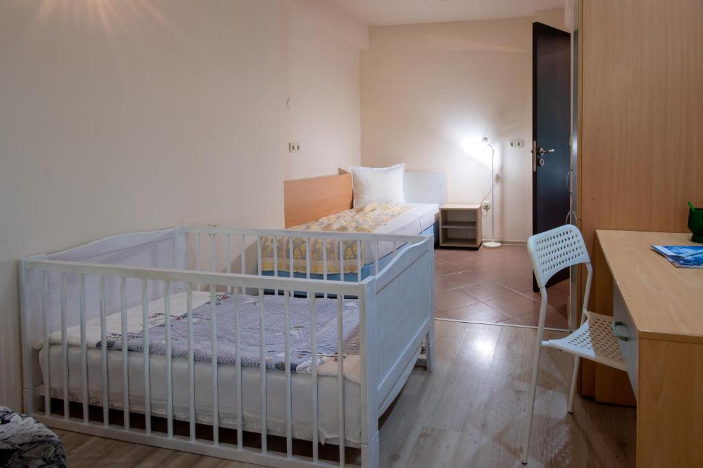 Postel nebo postele na pokoji v ubytování Ariana Hotel