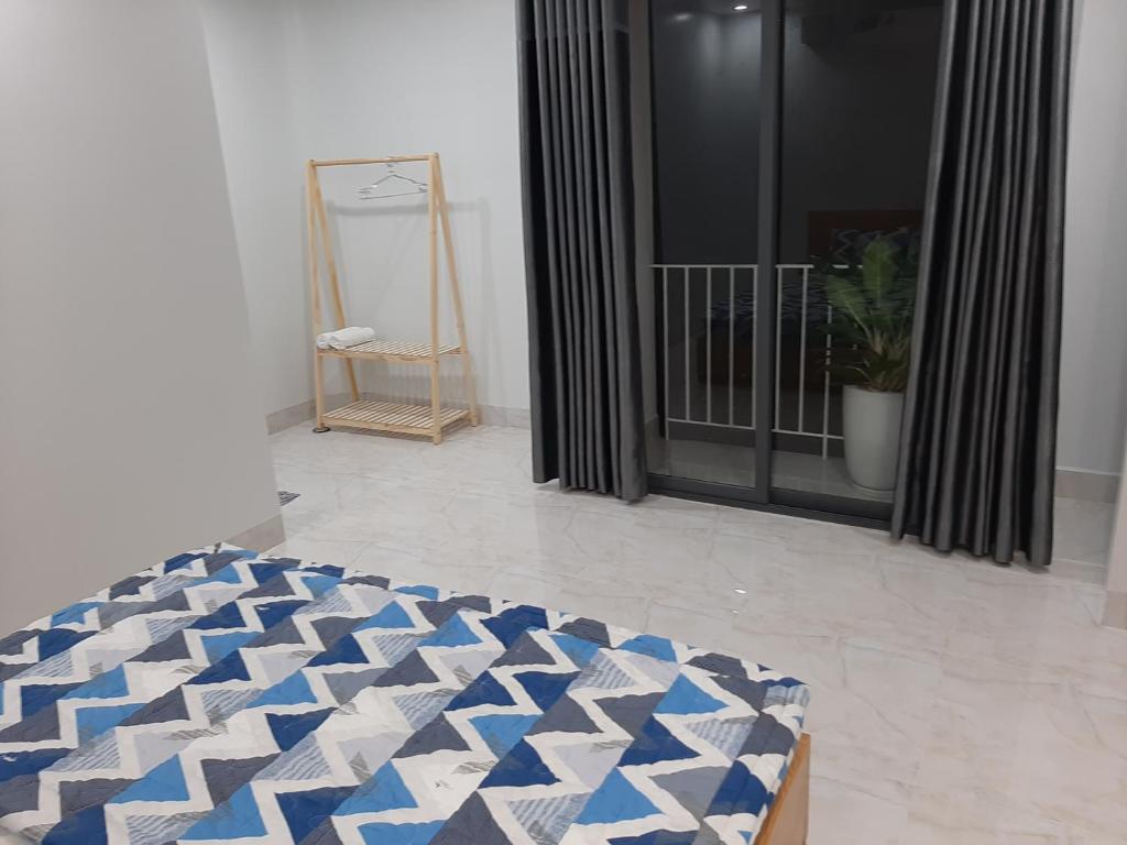 Letto o letti in una camera di Thom's Homestay