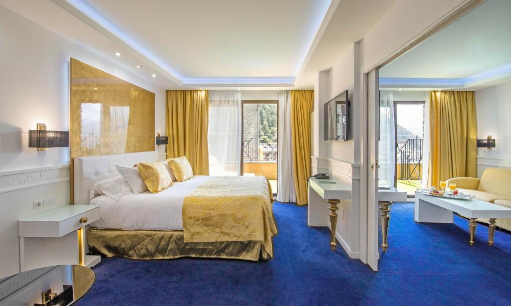 Postel nebo postele na pokoji v ubytování Hotel Princesa Parc Excellence