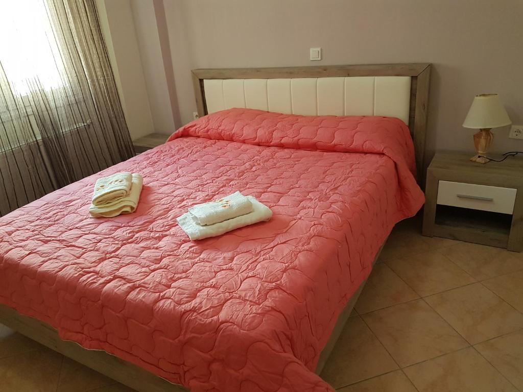 Postel nebo postele na pokoji v ubytování Dimitris House Petriti