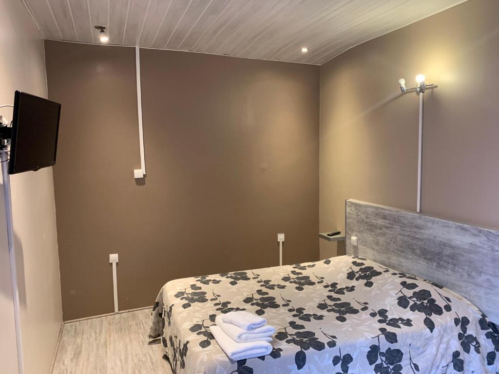 Postel nebo postele na pokoji v ubytování hôtel Le Cosy