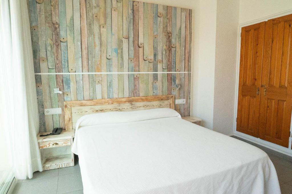 Postel nebo postele na pokoji v ubytování Hotel S'Agoita