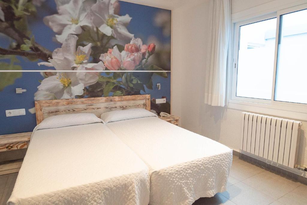 Postel nebo postele na pokoji v ubytování Hotel S'Agoita