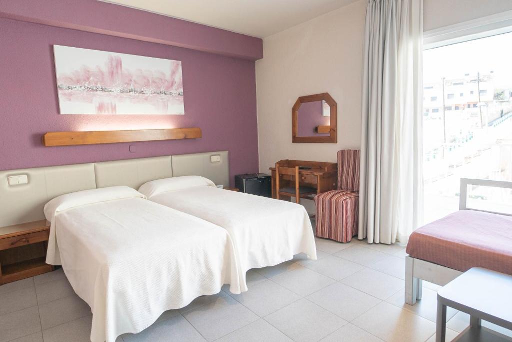 Postel nebo postele na pokoji v ubytování Hotel S'Agoita