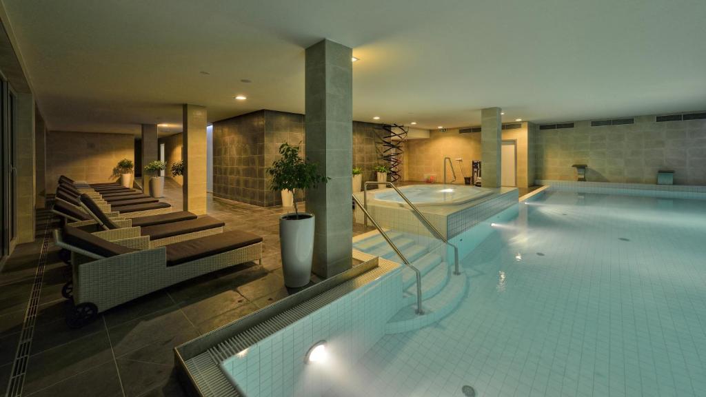Bazén v ubytování Hotel Pohoda nebo v jeho okolí