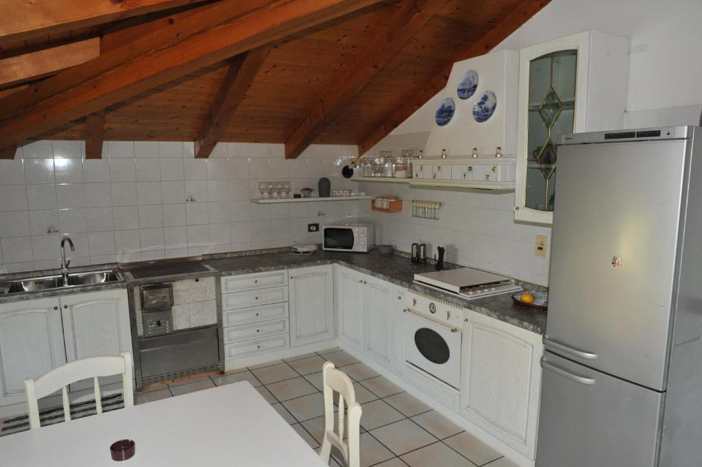 Kuchyňa alebo kuchynka v ubytovaní Residenza Mariella