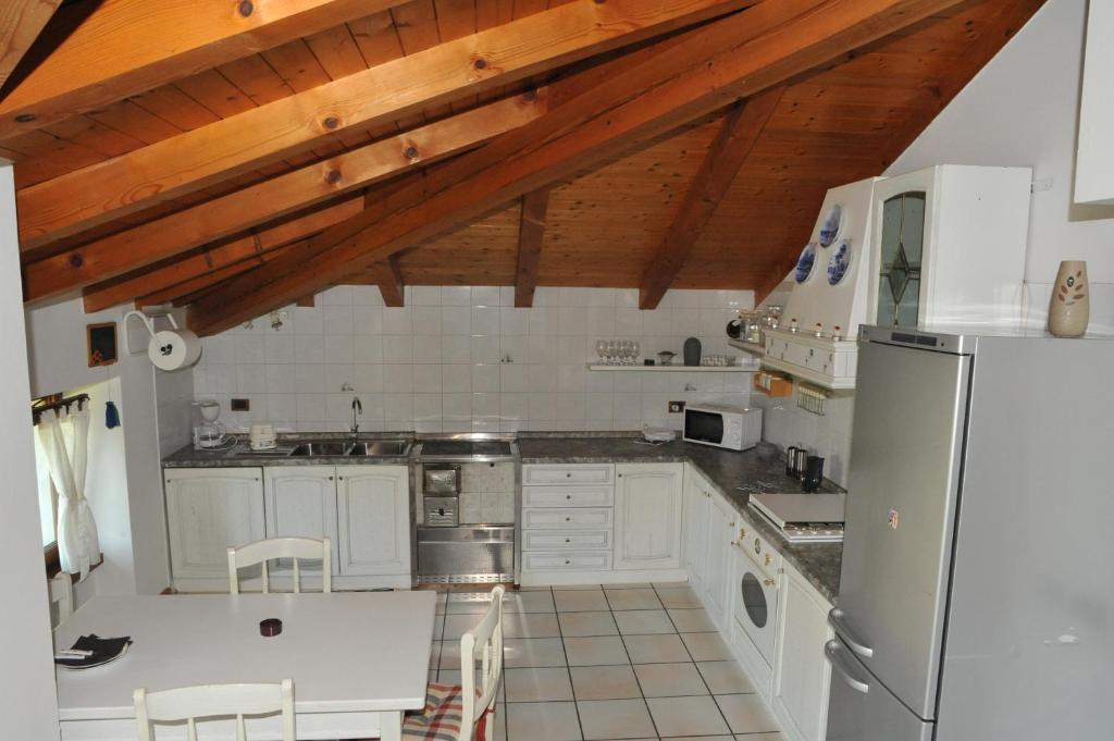 Kuchyňa alebo kuchynka v ubytovaní Residenza Mariella