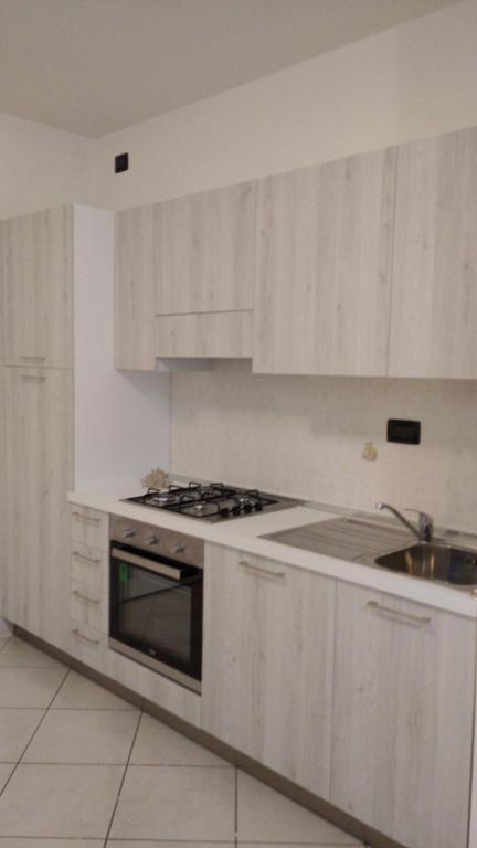 Kuchyň nebo kuchyňský kout v ubytování Elegantemare apartment