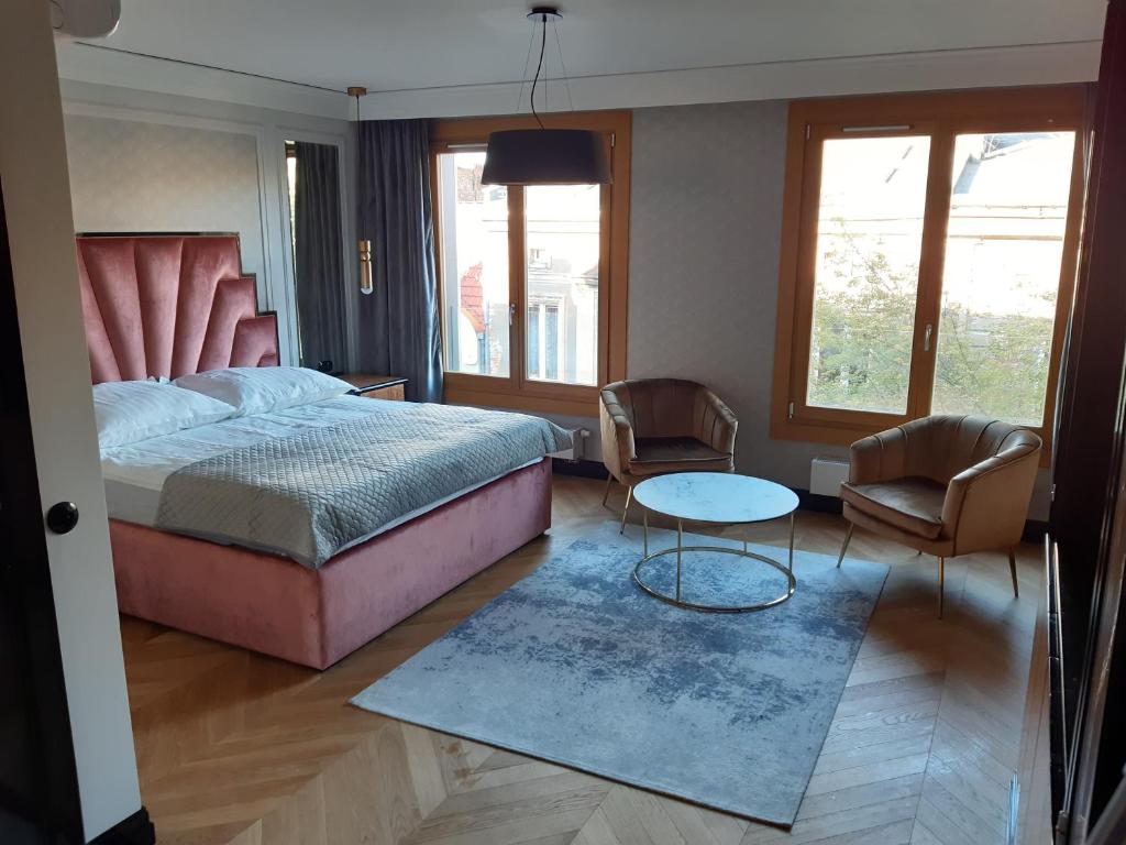 Posteľ alebo postele v izbe v ubytovaní KR47 Kossak Residence