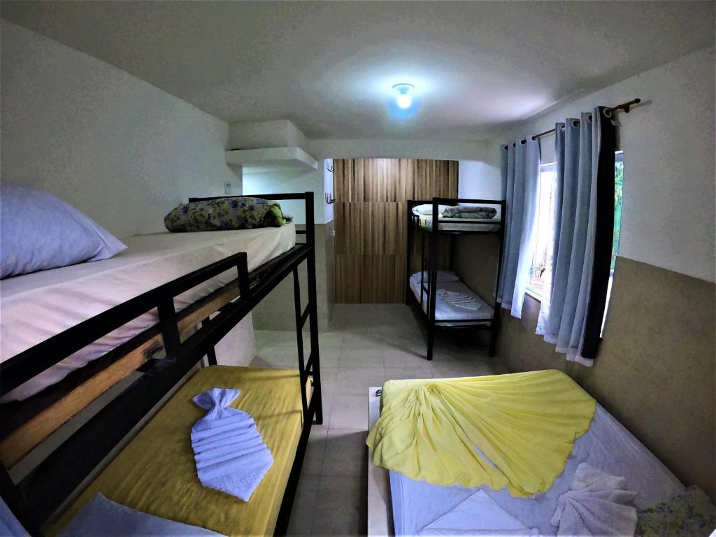 Postel nebo postele na pokoji v ubytování Mata Virgem Hostel e Pousada