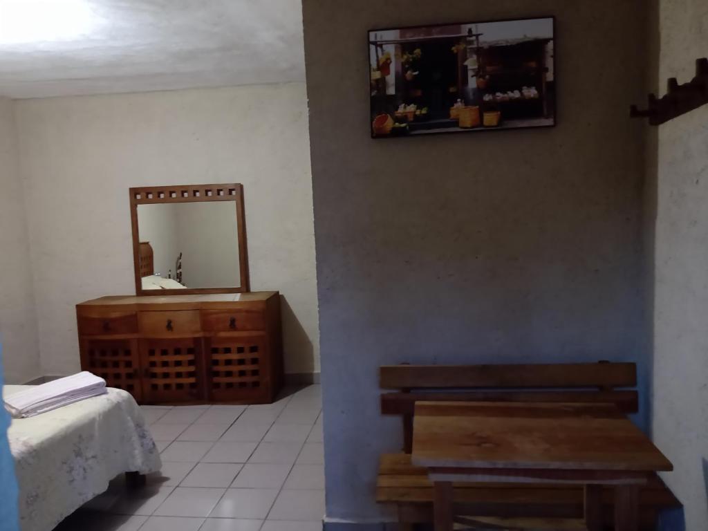 Postel nebo postele na pokoji v ubytování Hospedaje San Antonio Tepoztlán.