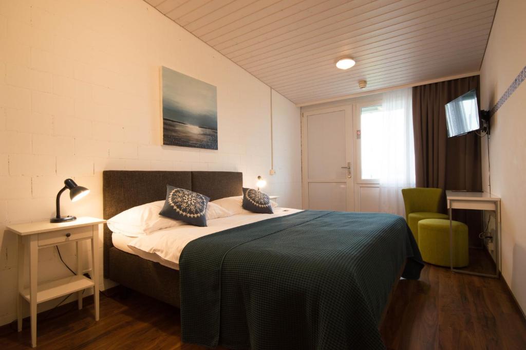 Postel nebo postele na pokoji v ubytování Hotel Bodensee-Arena