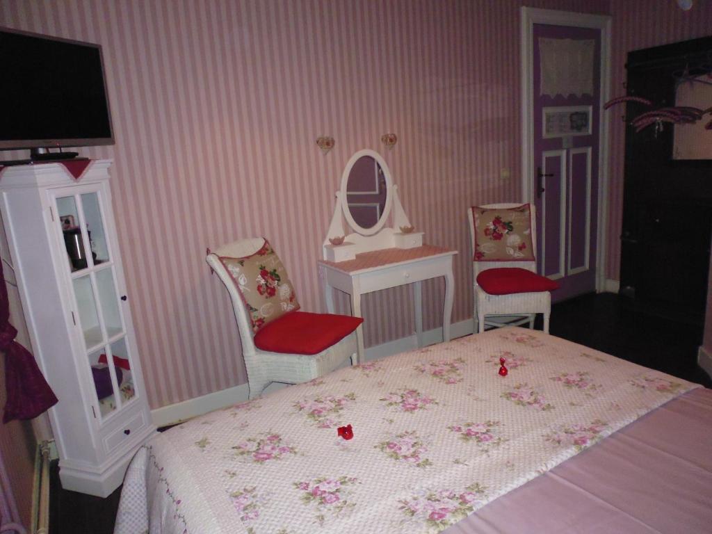 Postel nebo postele na pokoji v ubytování B&B De Vijf Zuilen