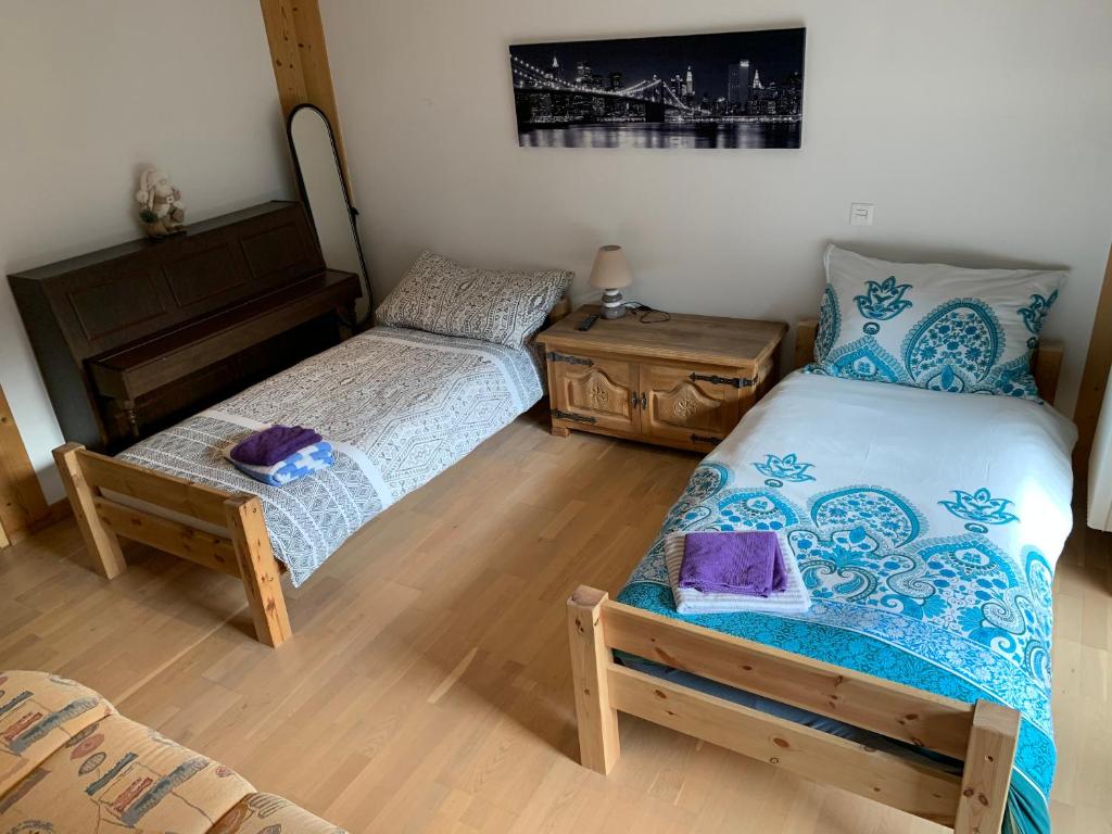Postel nebo postele na pokoji v ubytování Chalet Belmont