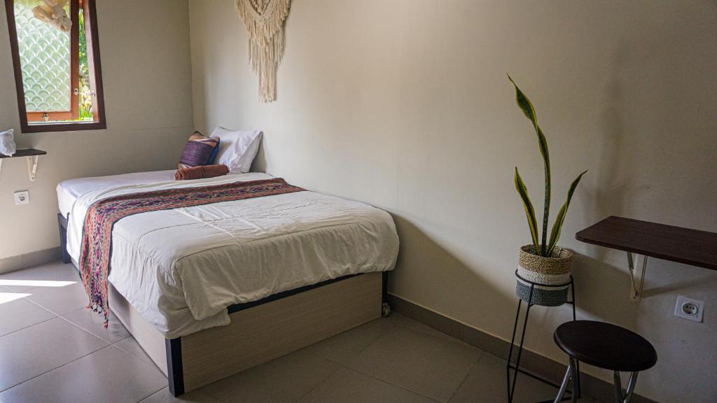 Postel nebo postele na pokoji v ubytování Home-Bience Hostel