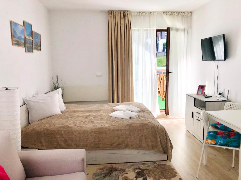 Postel nebo postele na pokoji v ubytování Temerso Studio-Apartment